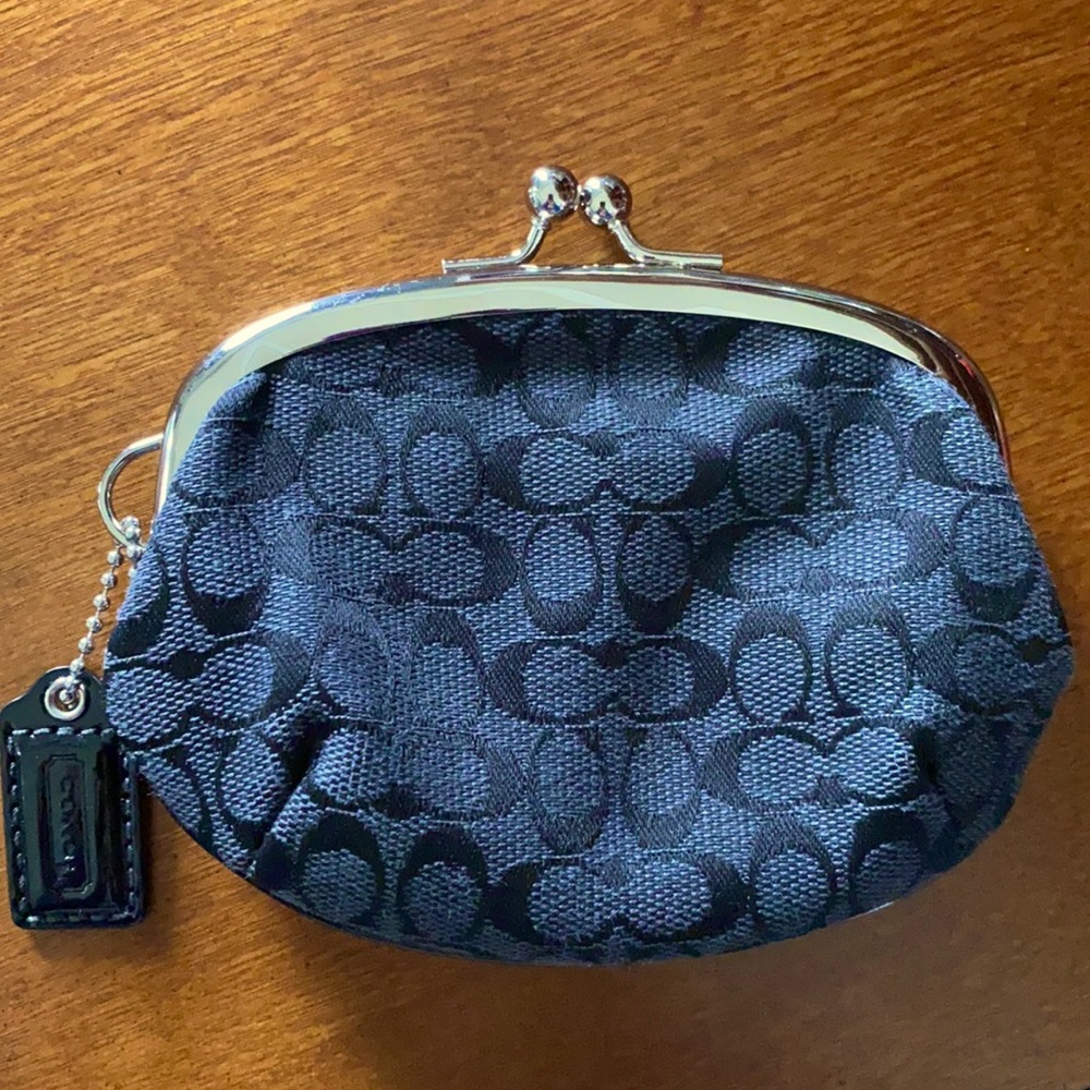 Black Coach kiss-lock coin purse. Used is excellent condition.